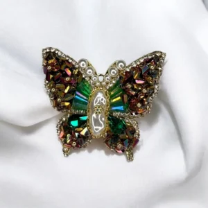 Broche papillon en acier inoxydable aux ailes nacrées