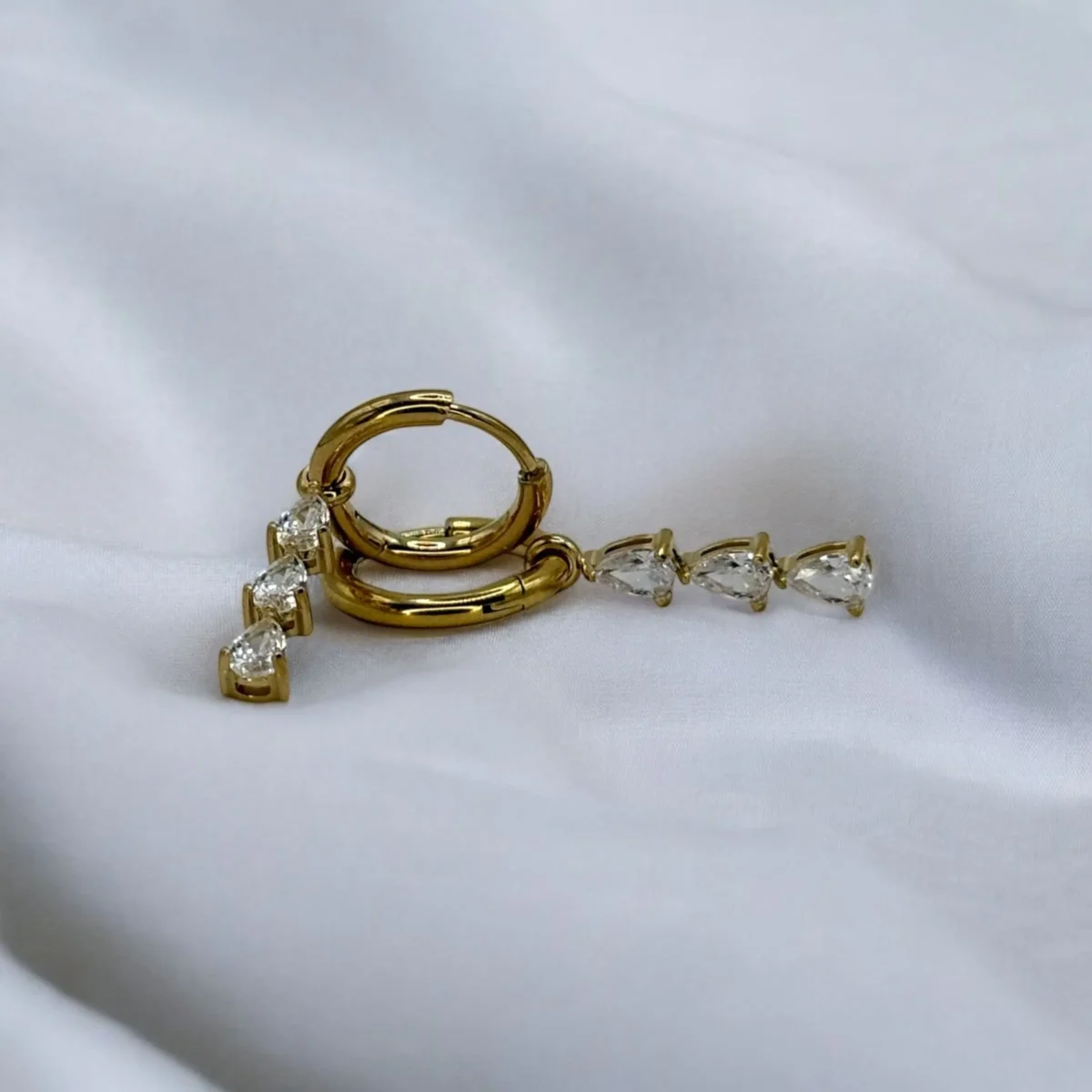 Boucle d'oreilles trilogie dorée