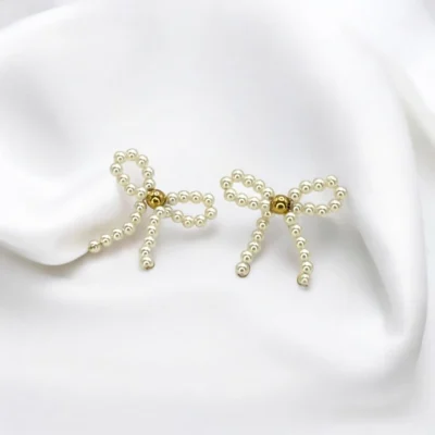 Boucles d'Oreilles Nœud Perlé Élégance