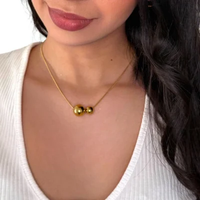 a woman wearing a necklace