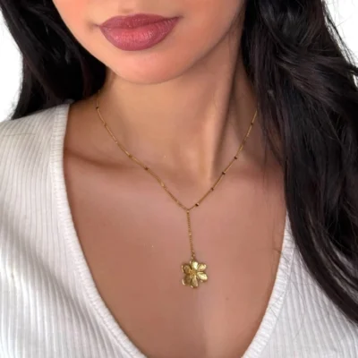 a woman wearing a necklace