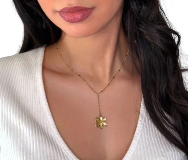 a woman wearing a necklace