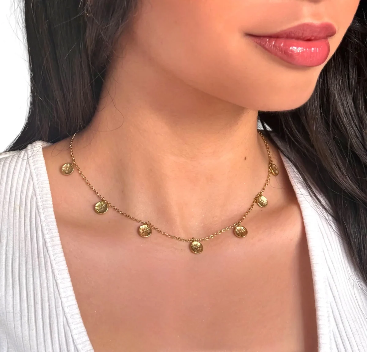 a woman wearing a necklace
