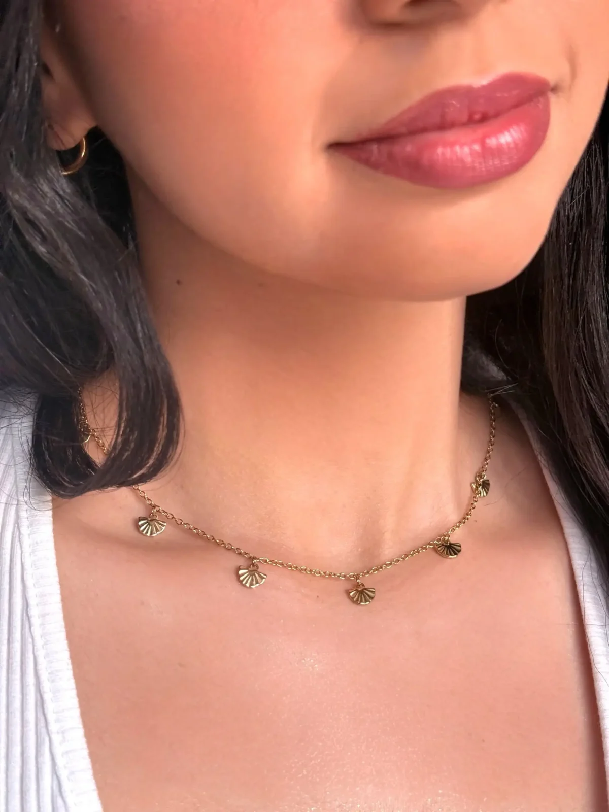 a close up of a woman's neck